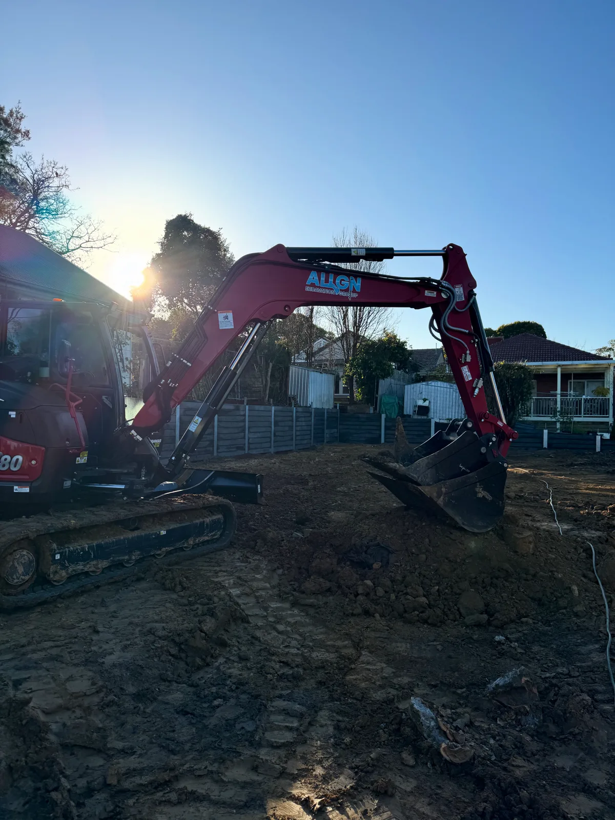 Excavation and in-progress retaining wall work by Align Excavation Group